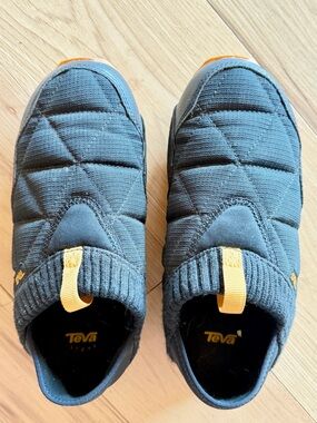 Teva Women’s Black Quilted Slip-On Shoes with Yellow Pull Tabs